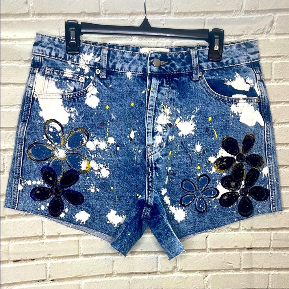 Oli & Hali Blue Jean Shorts with Distressed Hem and Floral Design